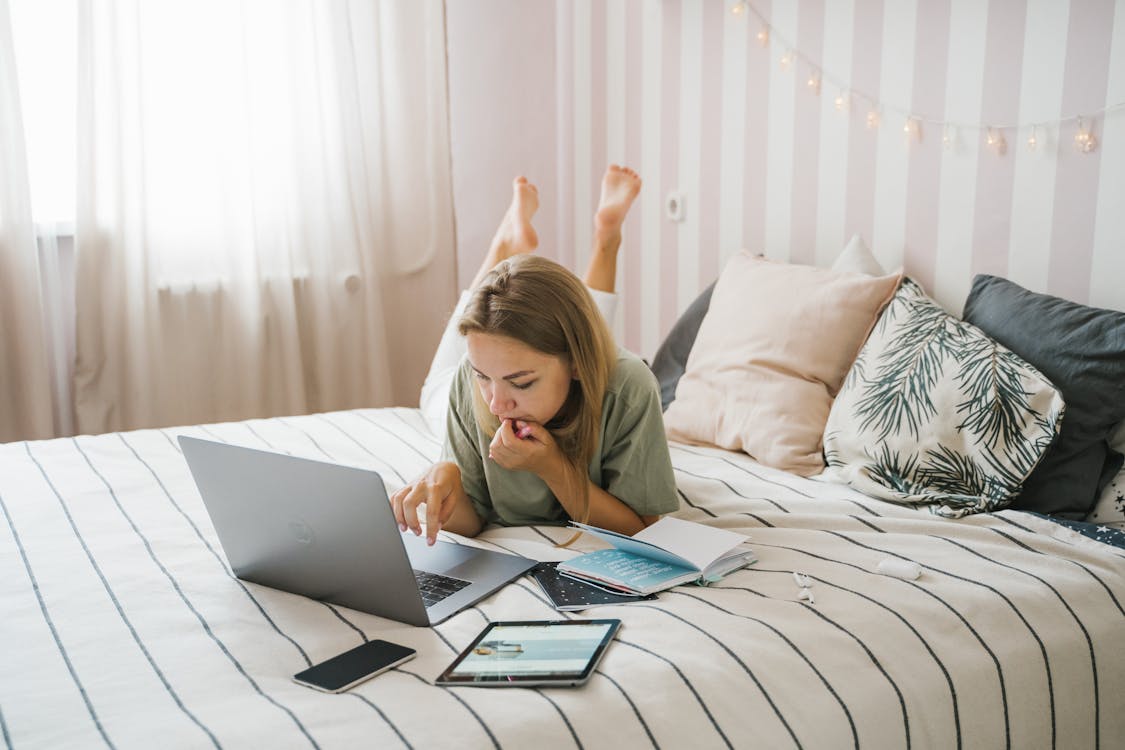 Professional woman working remotely on laptop - representing the new era of VA business leadership